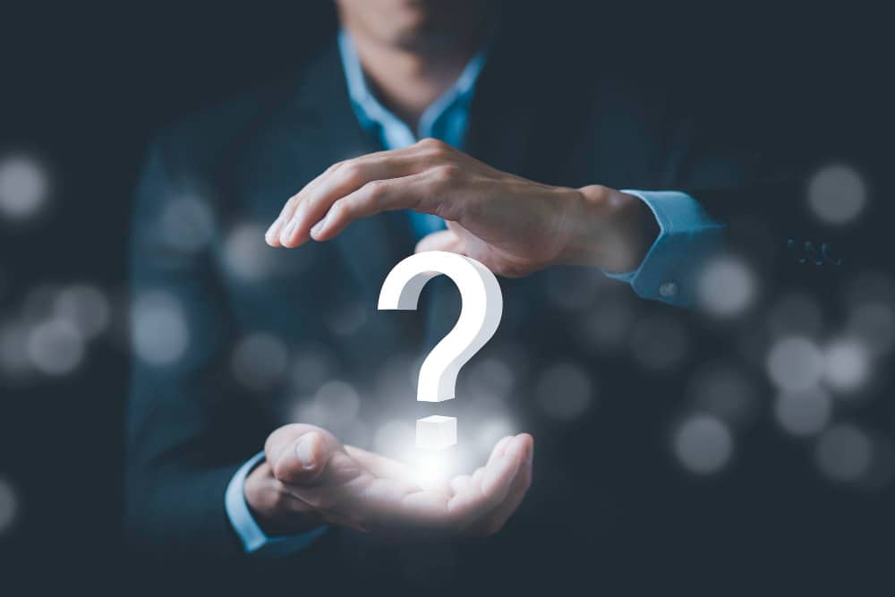 https://tamminainfotech.com/wp-content/uploads/2023/05/ask-question-online-concept-businessman-hand-hold-interface-question-marks-sign-web-question-marks-drawn-black-background-concept-searching-answer-uncertainty-problem-solving-1.jpg